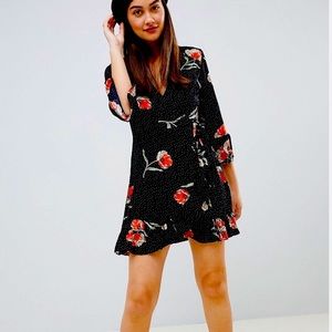 Influence floral and polka dotted wrap dress